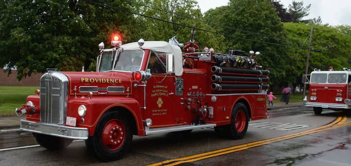 [CREDIT: Rob Borkowski] Fire trucks line down West Shore Road in the 2017 Memorial Day parade.