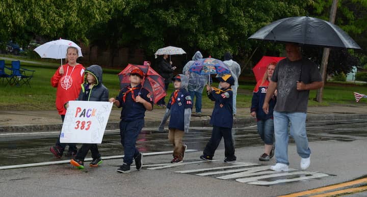 [CREDIT: Rob Borkowski] Cub Scout Pack 383 marches down West Shore Road in the 2017 Memorial Day parade.