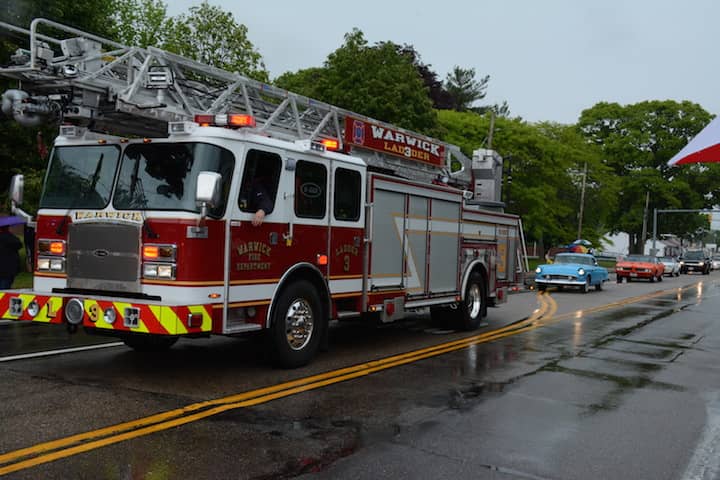 [CREDIT: Rob Borkowski] Ladder 3 cruises by at the 2017 Wawrick Memorial Day Parade on West Shore Road.