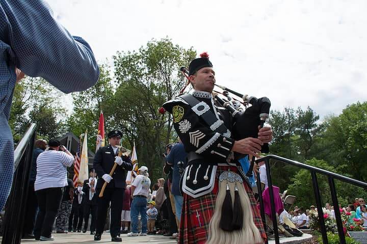 [CREDIT: Mary Carlos] A bagpiper with the Warwick/West Warwick Honor Guard at the start of the Station Fire Memorial Dedication.