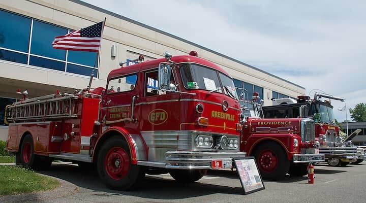 [CREDIT: Mary Carlos] Some of the trucks brought by the Rhode Island Antique Fire Apparatus Society. They arrived with their sirens blaring, which was a delight for the crowd. They won the Best Club Participation award at the Cause for Paws car show.