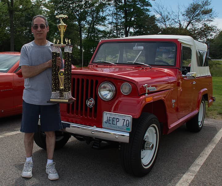 [CREDIT: Mary Carlos] Paul DeBiasio of Hope won Best of Show for his 1970 Jeepster Commando at the Cause for Paws car show.