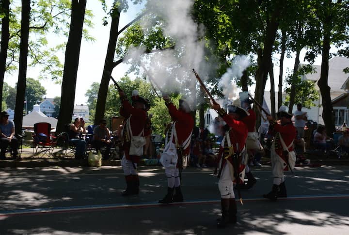 [CREDIT: Rob Borkowski] The Pawtuxet Rangers perform a musket salute at the 2017 Gaspee Days Parade.