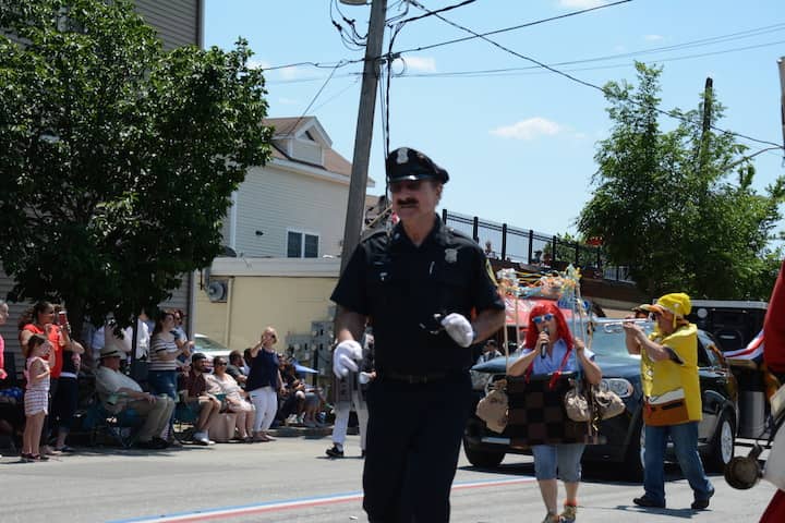 [CREDIT: Rob Borkowski] Dancing Cop Tony Lepore at the 2017 Gaspee Days Parade.