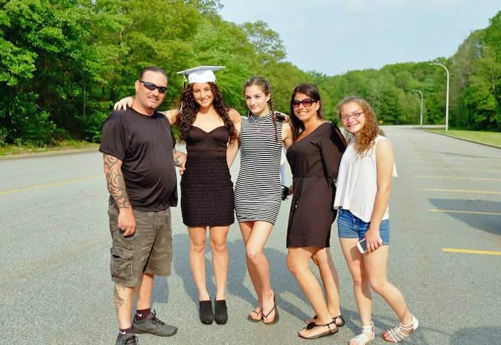 [CREDIT: Lauren Kasz] The family of graduate Kristiana Altieri pose for a picture before the ceremony.at the Pilgrim High School Class of 2017 graduation.