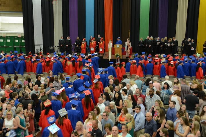 [CREDIT: Rob Borkowski] Toll Gate High School's Class of 2017 take their seats during graduation at CCRI Wednesday night.
