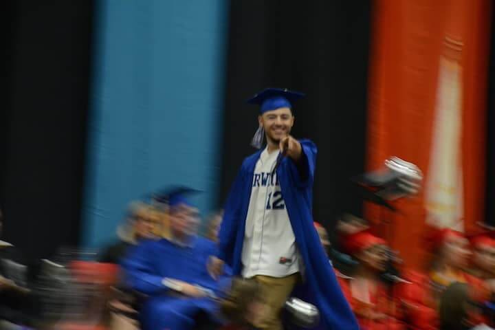 [CREDIT: Rob Borkowski] A new Toll Gate Graduate makes his way to accept his diploma.