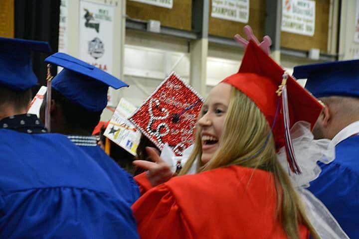 [CREDIT: Rob Borkowski] Nadia Xavier is pretty spirited herself while waiting for her diploma Tuesday at CCRI.