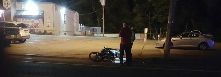 [CREDIT: Justin Suttles] A motorcycle and SUV crashed on West Shore Road Saturday night. Police are investigating the incident.