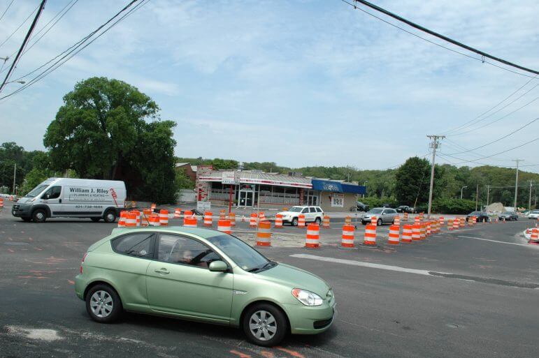[CREDIT: Rob Borkowski] A view of the traffic barrels set up in the center of Apponaug Four Corners June 30. 