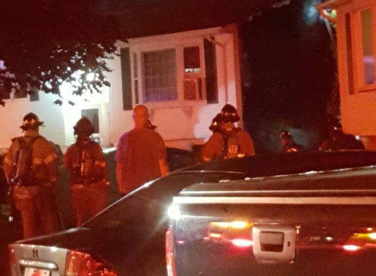 [CREDIT: Justin Suttles] The house at 14 Collingwood Drive caught fire July 4 and was put out by neighbors using garden hoses.