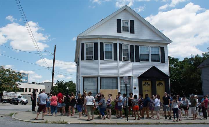 [CREDIT: Mary Carlos} A long line of people waited for the start of the Ice Cream Throw-down in Providence Sunday.