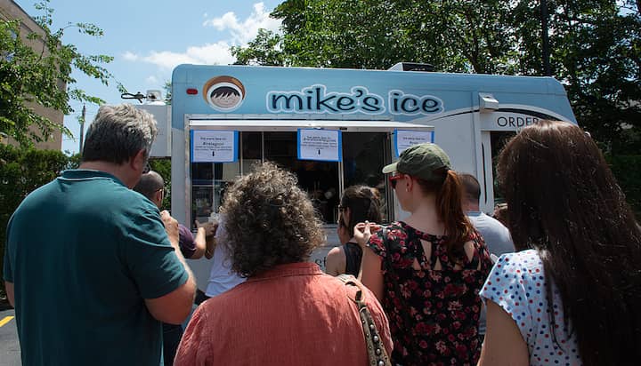 [CREDIT: Mary Carlos} The Mikes Ice truck split their lines into three flavors to move things along. 