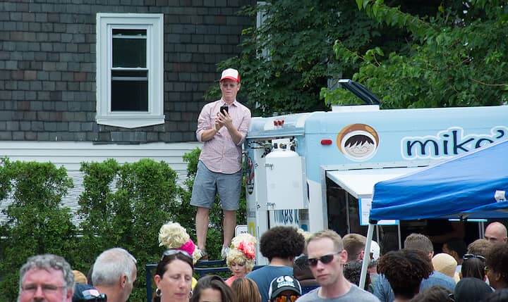 [CREDIT: Mary Carlos} Jim Nellis, organizer of the Ice Cream Throw-down, gets a high ground view of the action.