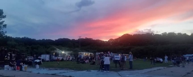 [CREDIT: Mary Carlos] People stayed till wall after dark during Thursday's Food Truck Night at Rocky Point.