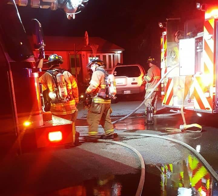 [CREDIT: Justin Suttles} Warwick Firefighters put out a fire at 31 Ryan Ave. July 10, 2017.