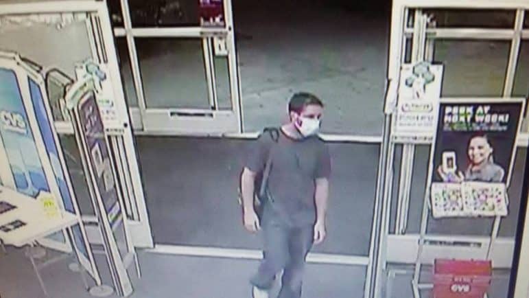 [CREDIT: Warwick Police] Police are seeking information on a masked man who entered the CVS in Greenwood and showed a gun, leaving with an undisclosed amount of cash.