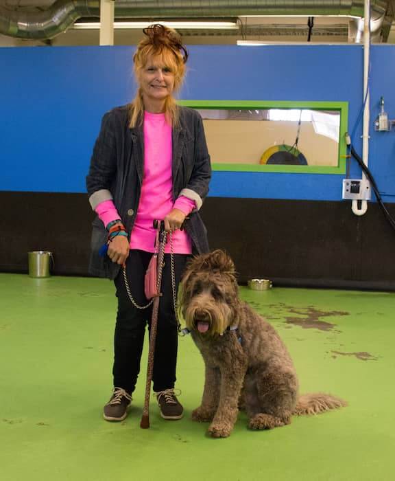 [CREDIT: Rob Borkowski] Helen L'Heureux and her dog, Rhody, the double-doodle, who won the look-alike competition.