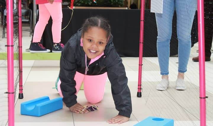 [CREDIT: (GSSNE] Scouts had fun with an obstacle course during the Girl Scout's event at the Warwick Mall.