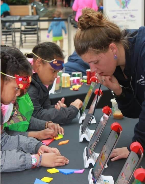 [CREDIT: (GSSNE] Scouts explored the sciences at the STEM booth during the Girl Scout's event at the Warwick Mall.