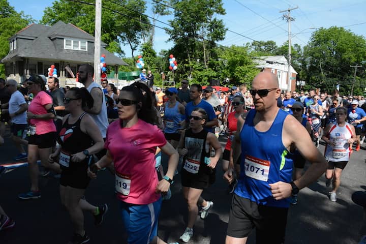 [CREDIT:Rob Borkowski] From center, left, Darcy Morgan, 48, of Sterling, CT, Laurie Chapman, 45, of Cranston, RI and Michael Mirandou, 44, of East Greenwich, RI at the start of the Gaspee Days 5K Saturday, June 10, 2018. 