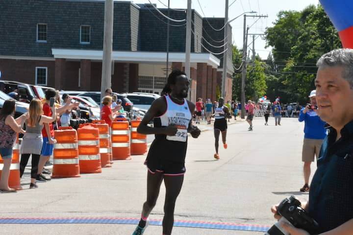 [CREDIT:Rob Borkowski] Amos Sang of Chicopee, MA came in second in the men's division at the Gaspee Days 5K Saturday, June 10, 2018. 