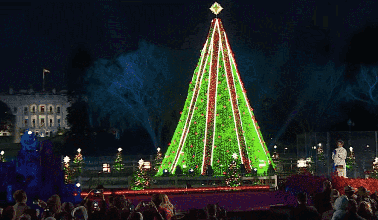 [CREDIT: Nationaltree.org] The 2018 National Christmas Tree Lighting Nov. 28 at President’s Park, co-presented by the National Park Service and the National Park Foundation. This year the tree sported pine green lights with red bands of lights running from top to bottom.