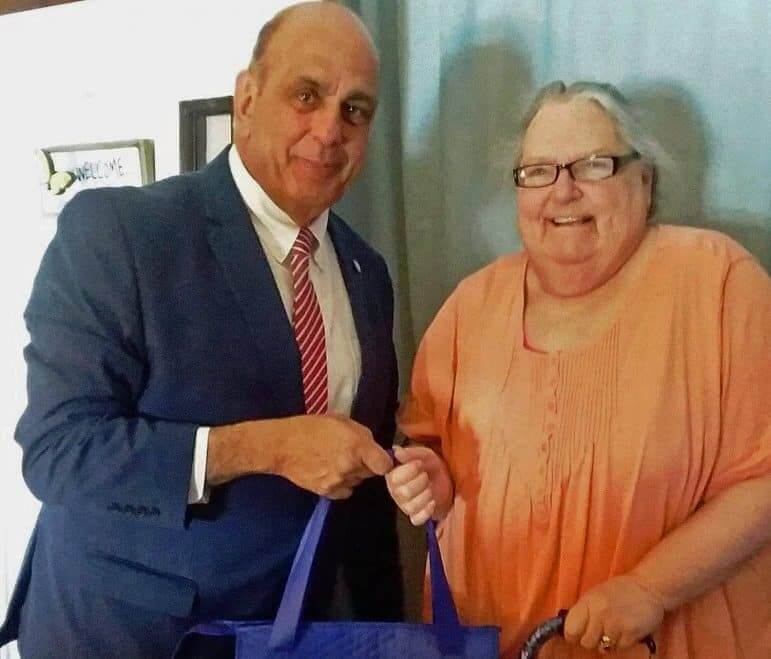 [CREDIT Meals on Wheels} Warwick Mayor Joseph J. Solomon brought her meals working with the program on Tuesday, March 28.