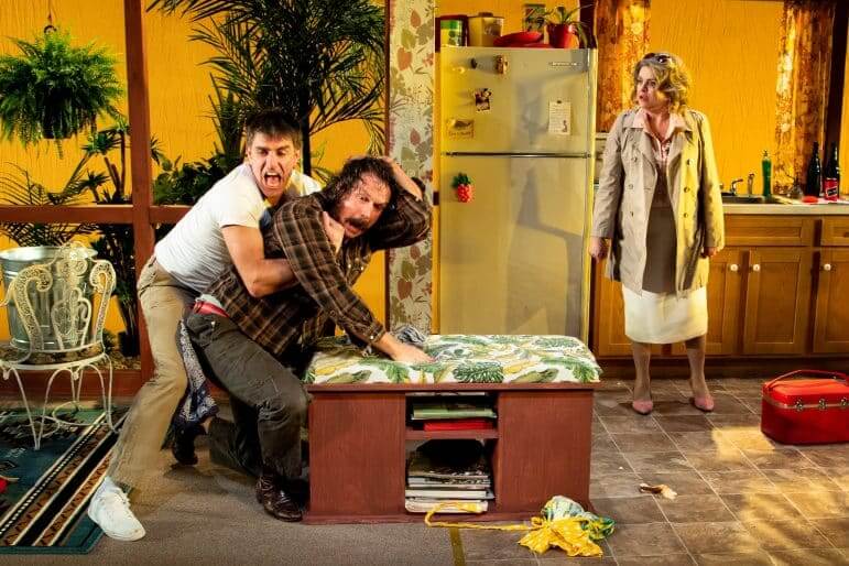 [CREDIT: Peter Goldberg] From left, Steve Kidd (Austin), Anthony Goes (Lee), and Rae Mancini (Mom) in The Gamm Theater's production of True West, playing through May 5.