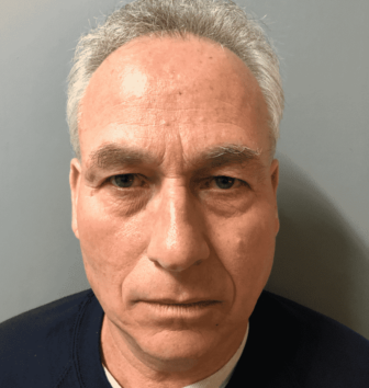 RI State Police arrested Hoxsie Elementary School teacher Richard Conti, 69, charging him with possession of child pornography, on April 2.