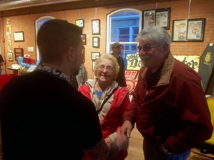 [CREDIT: Rob Borkowski] Eileen and Joel Kirschenbaum chat with Sean McCarthy, collector and historian and curator of the “Remembering Rocky Point Park! exhibit. 