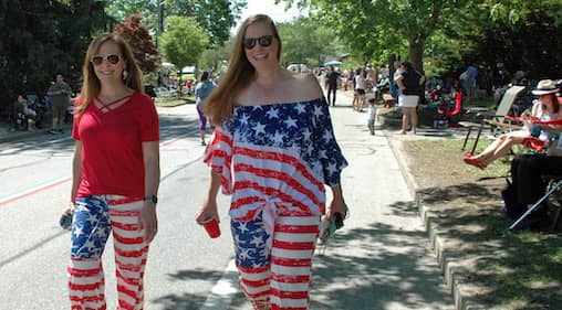 [CREDIT: Rob Borkowski] From left, Shawnah Farrell of Warwick and Elaine Vorro of Coventry are dressed patriotically for the 2019 Gaspee Days Parade Saturday, June 8.
