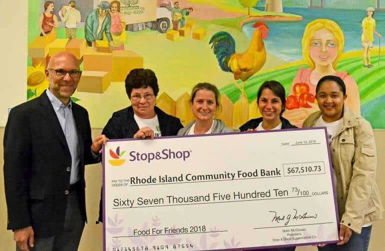 [CREDIT: Stop & Shop] From left, Andrew Schiff, Chief Executive Officer, Rhode Island Community Food Bank, Wendy Wisdom, Marketing Coordinator, Stop & Shop, Amy Thibault, External Communications and Community Relations Manager, Stop & Shop, Emilie DeVito, External Communications and Community Relations Specialist, Stop & Shop, and Amanda Barros, Design Traffic Coordinator, Stop & Shop, during a check presentation from the last Food For Friends drive.