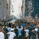 [CREDIT: NASA} New York City welcomes the Apollo 11 crew in a ticker tape parade down Broadway and Park Avenue. Pictured in the lead car, from the right, are astronauts Neil A. Armstrong, Michael Collins and Buzz Aldrin. The three astronauts teamed for the first manned lunar landing, on July 20, 1969.