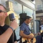 [CREDIT: Rob Borkowski} Guitarist Jim Joly, also proprietor of Greenwich Bay Wealth Management, perform for the crowd during Thursday's Music on Main Stroll in East Greenwich.