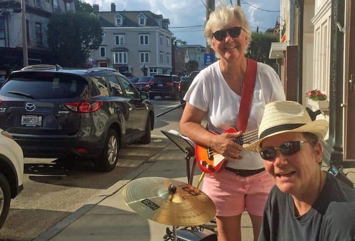 [CREDIT: Rob Borkowski} Jean Brown and Shawna Southern perform outside The Greenwich Hotel & Lounge during Thursday's Music on Main Stroll in East Greenwich. 