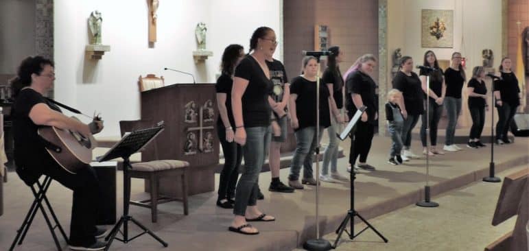 [CREDIT: Lincoln Smith] The Acoaxet Chapel Praise Team from Westport, MA performs during a Sept. 22 benefit concert to aid the rebuild of the Woodbury Union Church lost to fire last year.