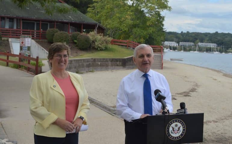 [CREDIT: Sen. Jack Reed's Office] U.S. Sen. Jack Reed and Megan DiPrete, DEM Chief, Planning & Development, at Goddard Park Monday. The two joined state officials at the park to announce $1.7M in federal funds for RI parks and public spaces.