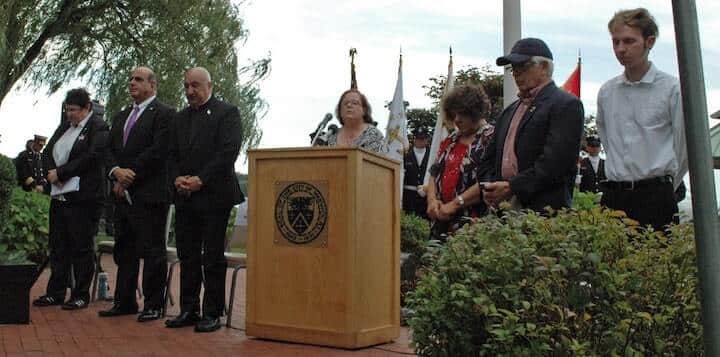 [CREDIT: Rob Borkowski] Rep. Camille Vella Wilkinson led Wednesday's Sept. 11 remembrance ceremony.