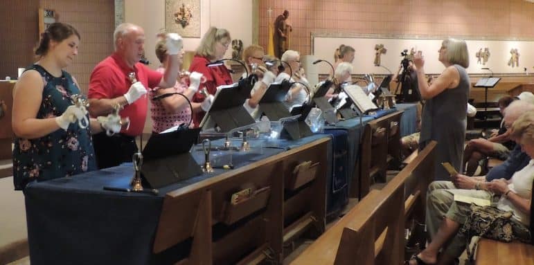 [CREDIT: Lincoln Smith] The Woodbury Bell Ringers perform during a Sept. 22 benefit concert to aid the rebuild of the Woodbury Union Church lost to fire last year.