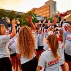 [CREDIT: Josh Campbell] Warwick Patriots Cheerleaders high-five during the 2019 Cheer for Dana-Farber game day performance for fundraising winners at Gillette Stadium on Aug. 22.