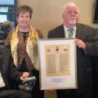 [CREDIT: Congressman Langevin's office] Nancy Beattie is presented with the Congressman John Joseph Moakley Award for Exemplary Public Service by Congressman Jim Langevin and representatives from the Greater Boston Federal Executive Board.