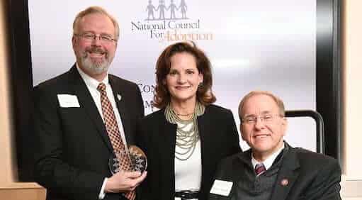 [CREDIT: Congressman Jim Langevin's office] Langevin receiving the National Council for Adoption’s ‘Friend of Adoption Award’ at Langevin's DC office.