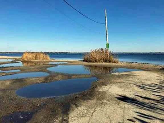 [CREDIT: DEM] [CREDIT: DEM] The Longmeadow Fishing Access Site in Warwick is often flooded, limiting public access. A new DEM, Warwick and Save the Bay project will improve vehicle access and make other environmental improvements.