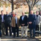 [CREDIT: Kim Wineman] Several Warwick officials attended Warwick's Veterans Day ceremony at Warwick Veterans Memorial Jr. High Nov. 11, 2019. Attending were From left, Councilors Donna Travis, Ed Ladouceur and Jeremy Rix, Rep. Dave Bennett, (D-Dist. 20), Rep. Joseph J. Solomon Jr., (D - Dist. 22), Councilor Jim Mcelroy (tan coat), Warwick Mayor Joseph J. Solomon, Sen. Michael J. McCaffrey, Councilor Richard Corley, and at far right, Sen. Mark McKenney, (D-Dist. 30) and Rep. Camille Vella Wilkinson (D – Dist. 21).