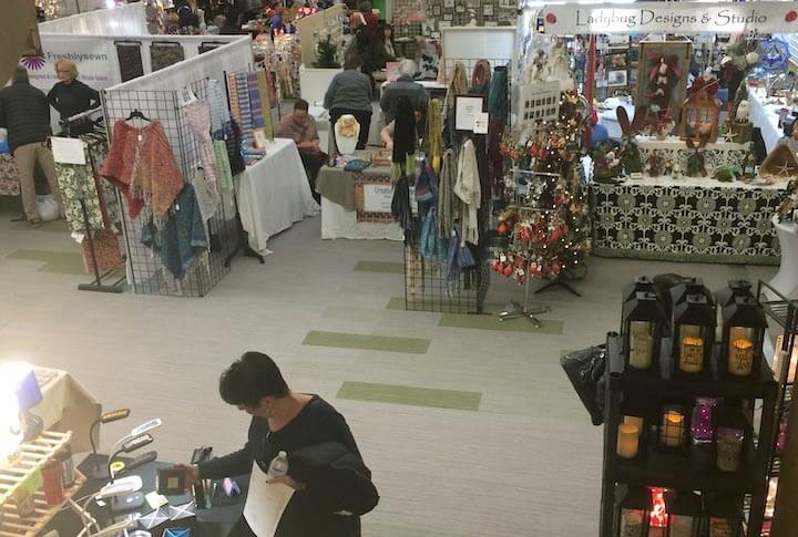 [CREDIT: Rob Borkowski] Shoppers peruse the wares sold by 96 vendors at CCRI during Small Business Saturday.