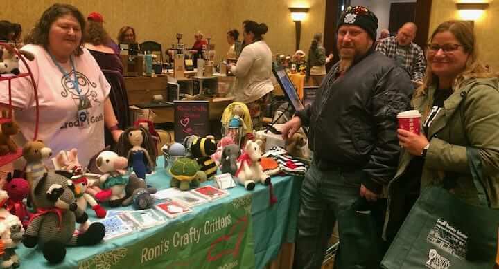 [CREDIT: Rob Borkowski] Rondel Dooley of Rondel's Crazy Critters with cousins John and Martha Costello at Crowne Plaza during Small Business Saturday.