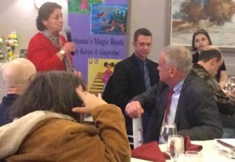 [CREDIT: Rob Borkowski] Sue Babin addresses a crowd of about 50 at Chelo's on Post Road Jan. 15 during the RIDDC's quarterly meeting.