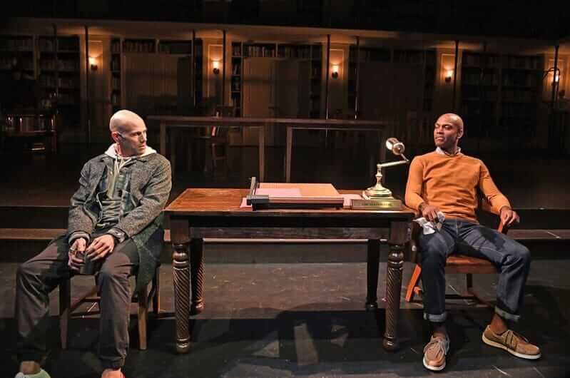 [CREDIT: Trinity Rep] Daniel Duque-Estrada as Sydney Carton and Taavon Gamble as Charles Darnay in Trinity Rep's "A Tale of Two Cities."