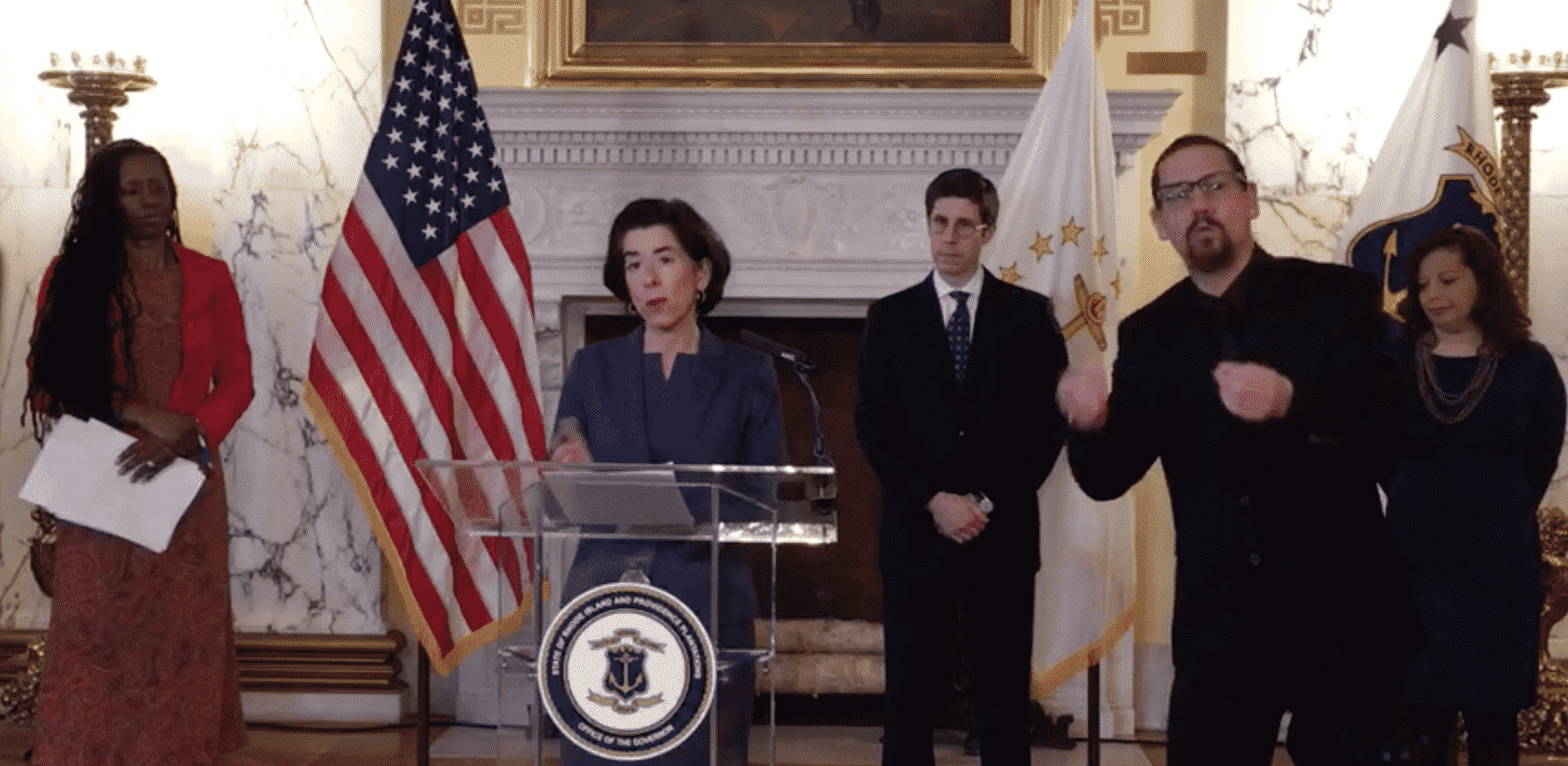 Gov. Gina Raimondo held a press conference March 30, announcing a fourth COVID-19 death, saying the state's commerce restrictions will likely last another month.